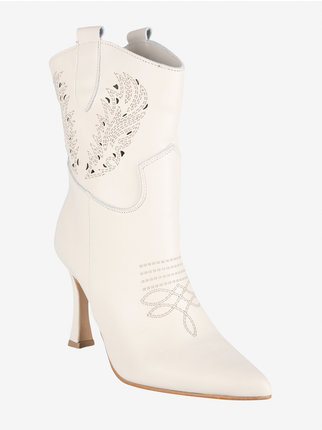 Ankle boots in perforated leather with heel