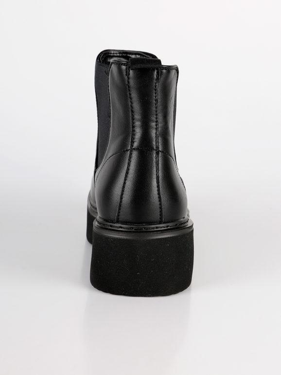 Black chelsea boots