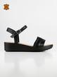 Black sandals with low wedge