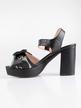 Black sandals with wide heel and bow