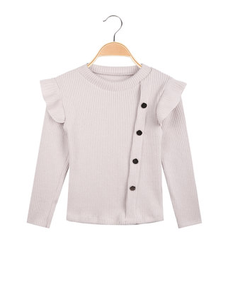 Girl's sweater with ruffles on the shoulders
