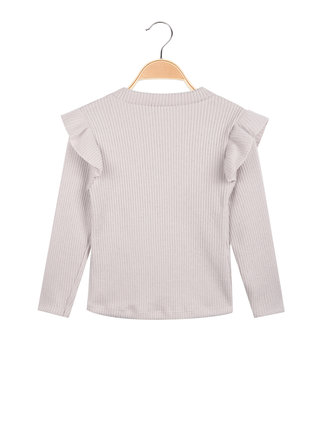 Girl's sweater with ruffles on the shoulders