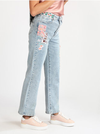 Jeans donna con ricami e toppe