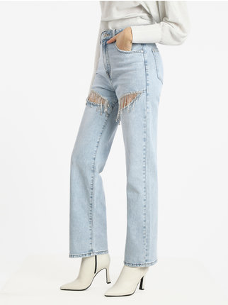 Jeans donna con strappi e applicazioni di strass