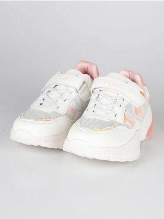 Little girl sneakers with tear