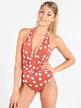 One-piece swimsuit with polka dots