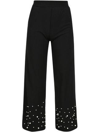 Pantalones negros con aberturas laterales