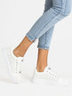 Perforated women's sneakers with platform