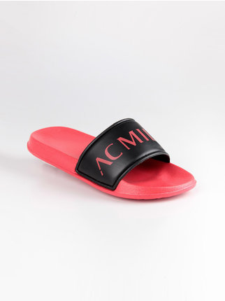 Pink and black rubber slippers