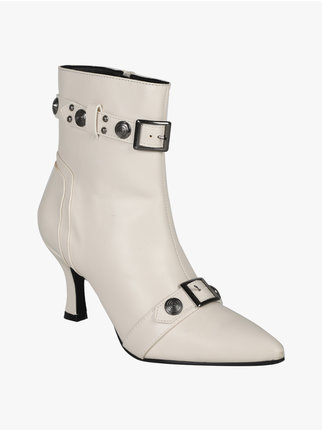 Pointed women's ankle boots with straps and studs