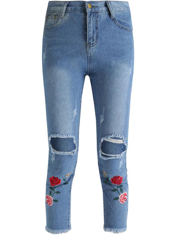 Ripped boyfriend jeans with floral embroidery