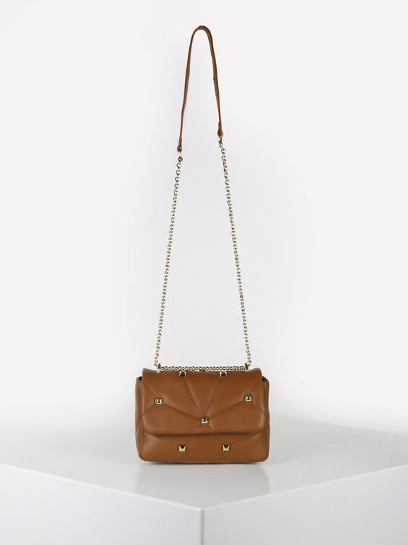 Shoulder bag in leather with studs