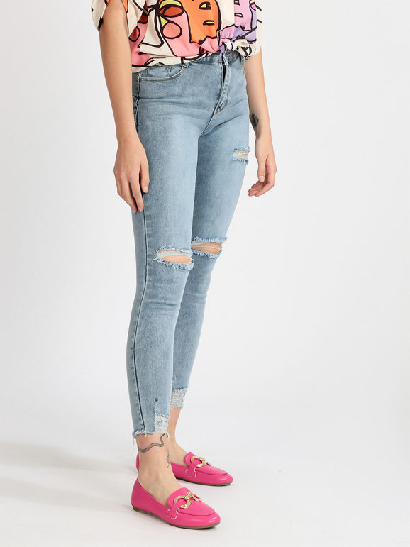Skinny woman jeans with rips