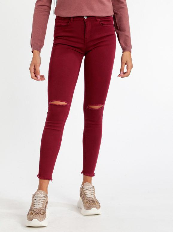 Skinny woman trousers with rips