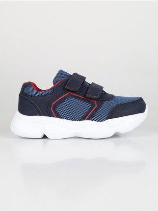 Sneakers for children with tear
