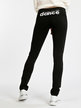 Sporty women's trousers with glitter lettering