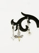Trio of earrings with pendants