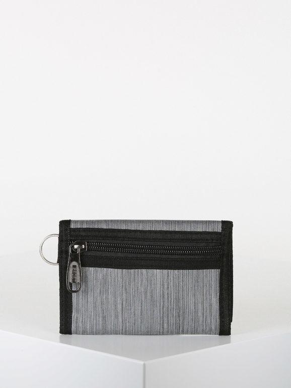 Wallet in fabric with tear