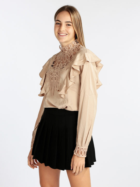 Women's blouse with macramé inserts