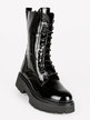 Women's boots in shiny leather with treaded sole