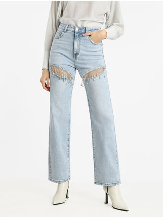 Women's jeans with tears and rhinestone applications