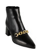 Women's leather ankle boots with chain
