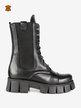 Women's leather combat boots with treaded sole