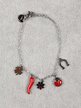 Women's steel bracelet with charms