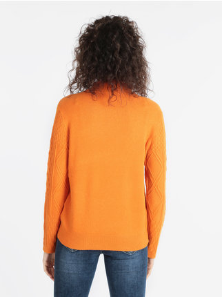 Women's turtleneck sweater with raised cable weave